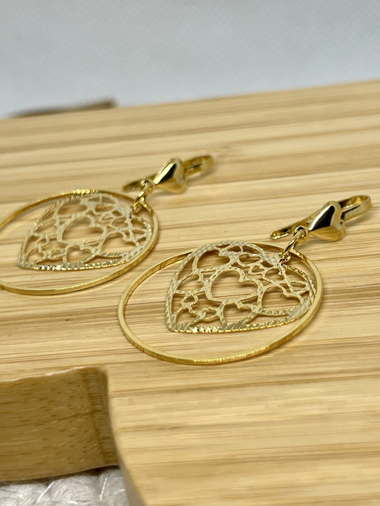 Brinco com Arcos e Coração Banhado a ouro 18k