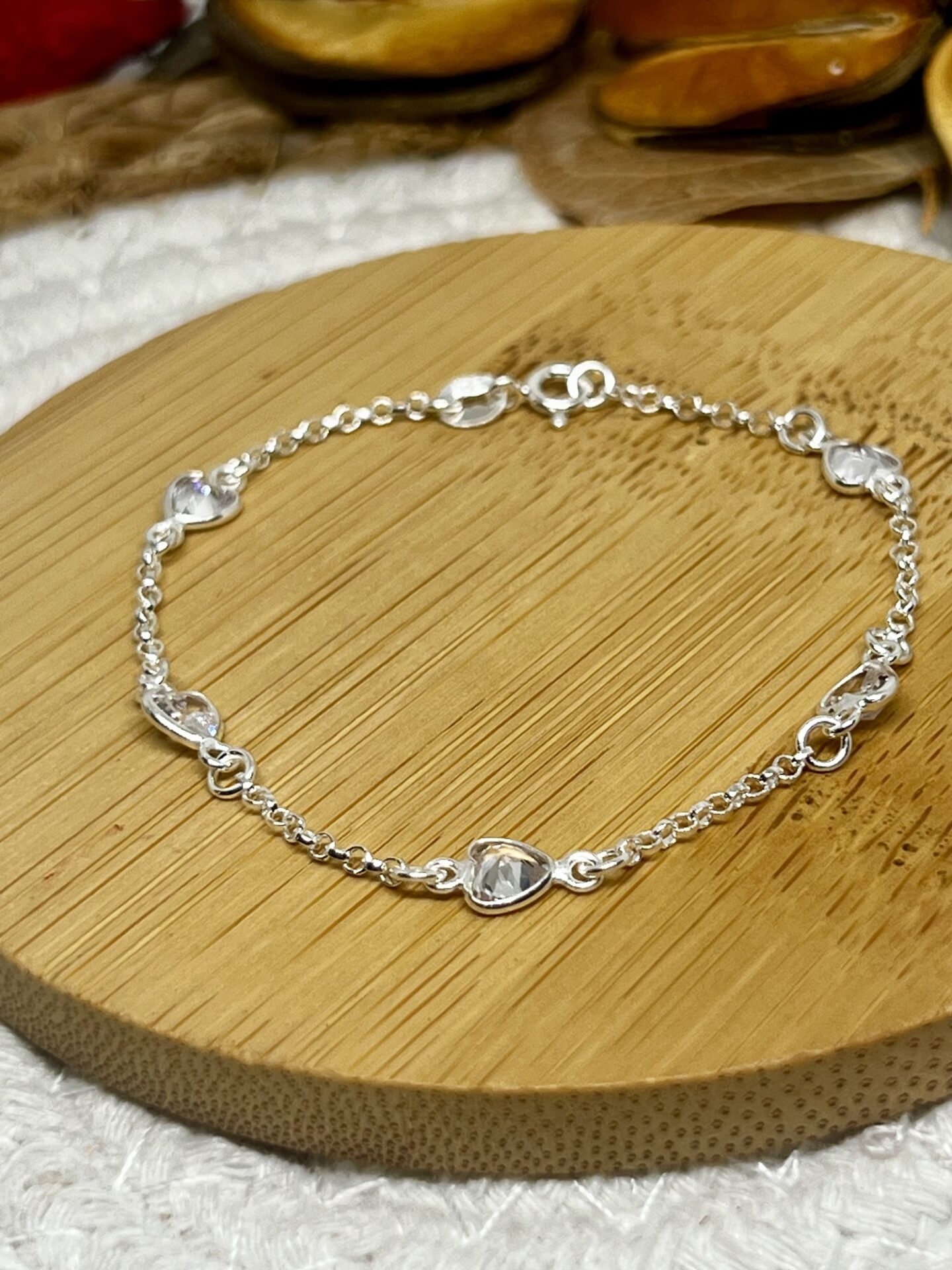Pulseira em Elos de Zircônias em Formato de Coração, em Prata 925